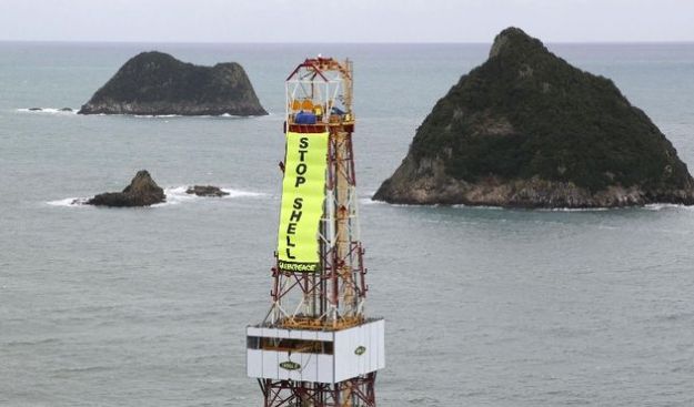 Activists Board Shell Contracted Drillship greenpeace shell alaska