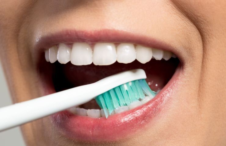 denti puliti pratica lavaggio