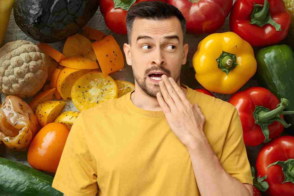 persona davanti a verdure e ortaggi